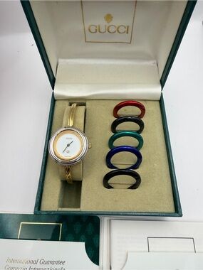 Gucci Gold-Tone Bangle Watch with Interchangeable Colored Bezels